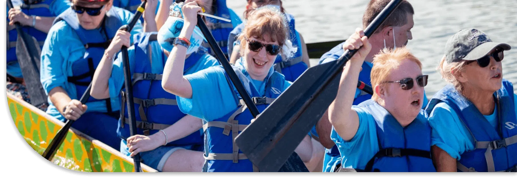 Team rowing a dragon boat