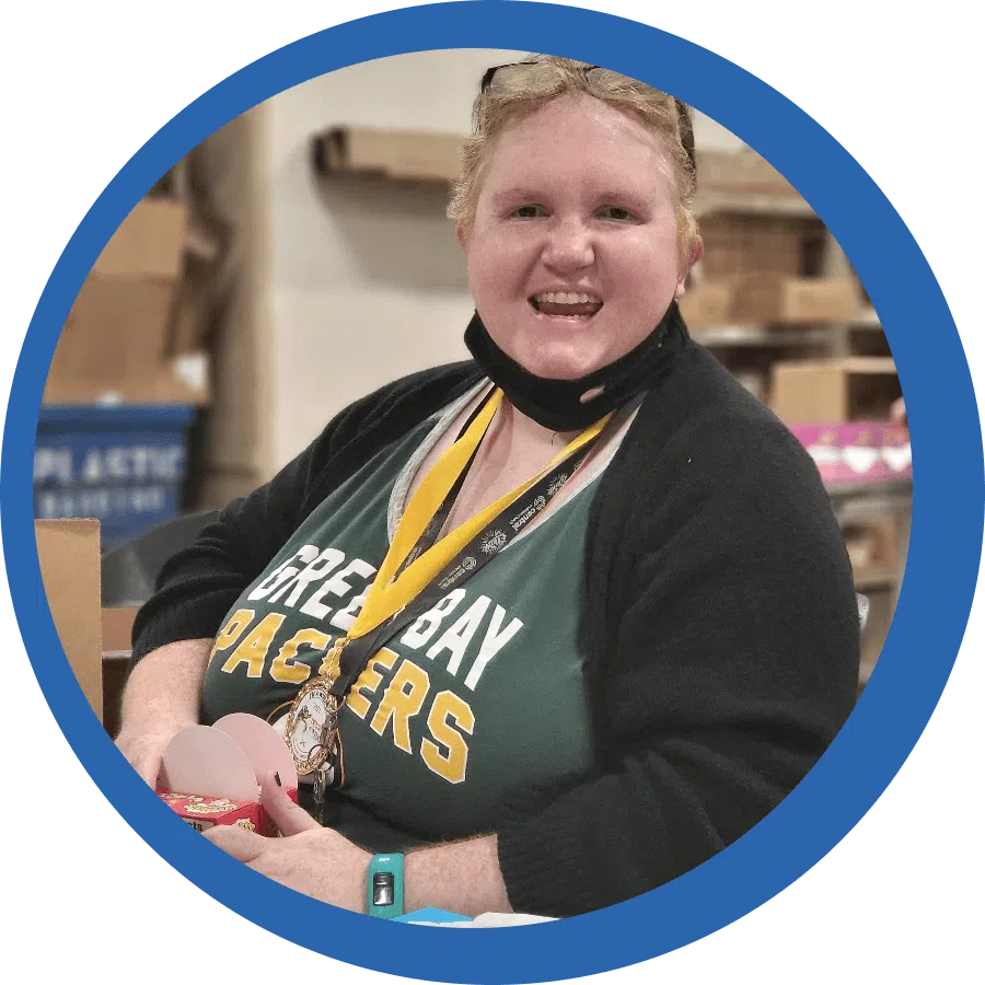 Woman smiling wearing a a Packers shirt