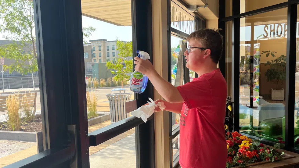 Client cleaning window.